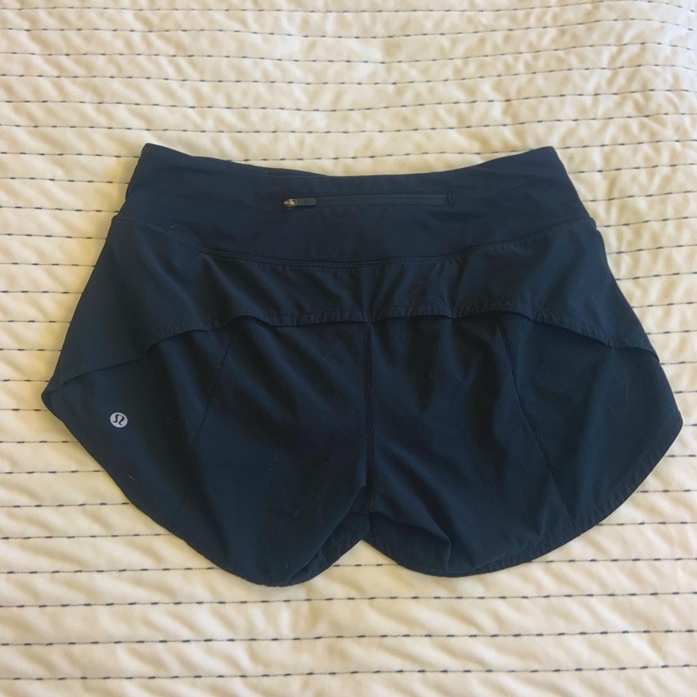 LIKE NEW lululemon shorts. Size 6 tall.